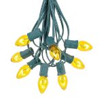 100 C7 String Light Set with Yellow Bulbs on Green Wire
