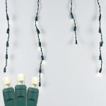 Warm White LED Icicle Lights on Green Wire 70 Bulbs