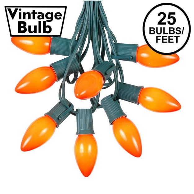 C9 25 Light String Set with Ceramic Orange Bulbs on Green Wire