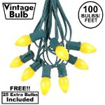 100 C7 String Light Set with Yellow Ceramic Bulbs on Green Wire