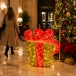 Gold and red 3D gift box in an elegant hotel lobby