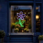 Purple LED rope light flower displayed in a commercial storefront window