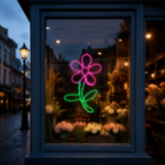 Pink LED rope light flower displayed in a commercial storefront window