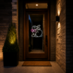 LED rope light Easter bunny displayed on a residential entry door