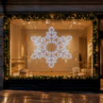 5 foot blue and pure white LED snowflake displayed in a commercial storefront window