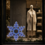 36 inch LED snowflake displayed in a commercial storefront window