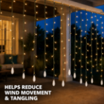 Warm white curtain lights hanging over a patio with white weights holding each drop straight