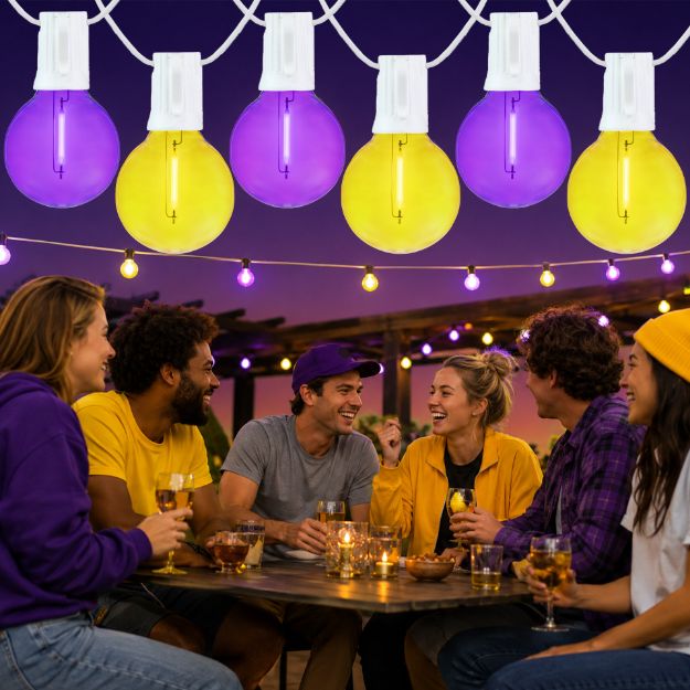 Purple and Yellow LED filament G40 globe string lights glowing over an outdoor game day gathering
