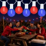 Red and Blue LED filament G40 globe string lights glowing over an outdoor game day gathering