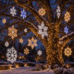 LED rope light snowflakes in a range of sizes hanging from a snow-covered tree at night