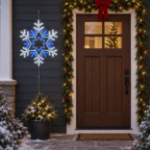 30" Deluxe LED Snowflake Pure White & Blue lit and mounted beside a front door on a snowy evening