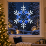 30" Deluxe LED Snowflake Pure White & Blue lit and mounted hanging in a holiday-decorated window at night