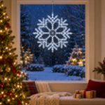 24" Fancy LED Snowflake Pure White lit and mounted hanging in a holiday-decorated window at night