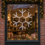 36" Traditional LED Snowflake Pure White lit and mounted displayed in a lit, decorated storefront window