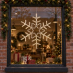 36" Deluxe LED Snowflake Warm White lit and mounted displayed in a lit, decorated storefront window