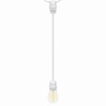 White socket extender hanging from a patio string light with a lit bulb