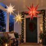Covered porch at dusk decorated with lit Moravian stars