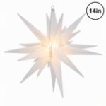 Clear frosted 14 inch Moravian star lit from within, glowing evenly against white