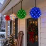 RetroGlo starlight spheres hung along a porch