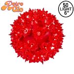 Lit red RetroGlo starlight sphere, 6 inch, shown against white