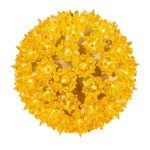 Lit gold RetroGlo starlight sphere at an angle