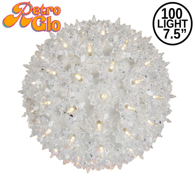 Lit clear RetroGlo starlight sphere, 7.5 inch, shown against white