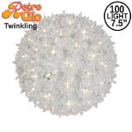 Lit clear twinkling RetroGlo starlight sphere, 7.5 inch, shown against white