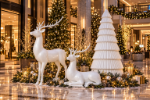 White reindeer commercial decor setting indoors