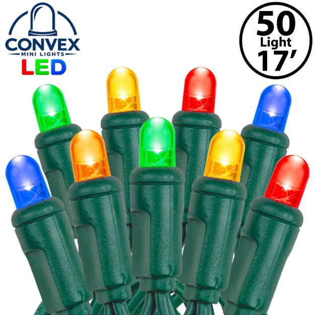 Close-up of multi color 5mm convex LED mini light bulbs on green wire