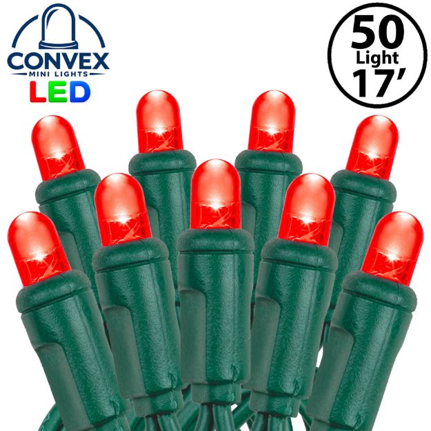 Close-up of red 5mm convex LED mini light bulbs on green wire