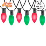 RetroGlo C9 Wicked Witch Halloween light set with lit purple and green ceramic bulbs on black wire