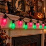 C9 Wicked Witch purple and green lights draped on a Halloween mantel and railing