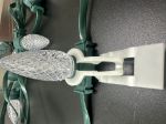 Green wire RGBW C9 bulb clipped into white C9 track
