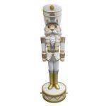 White silver and gold nutcracker statue